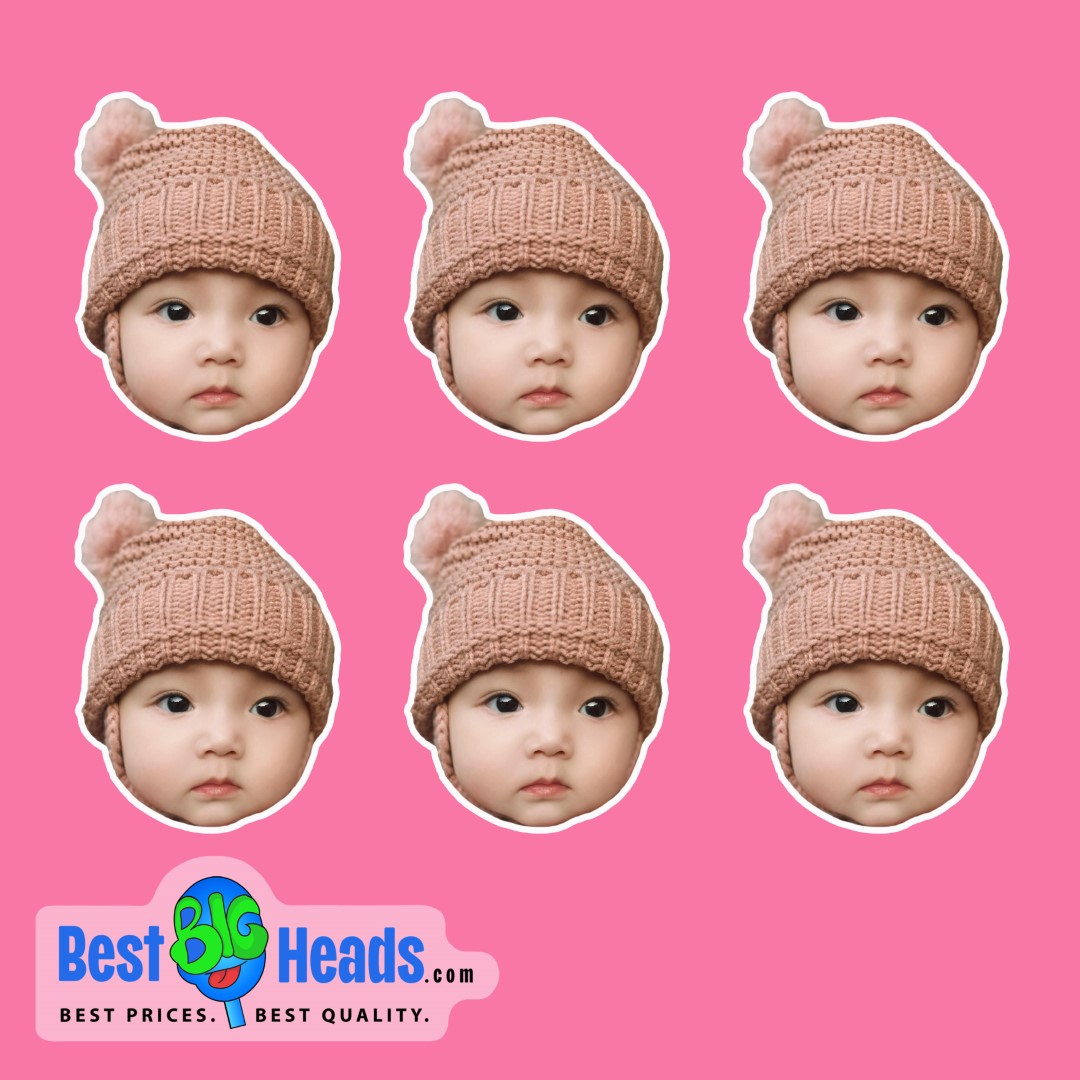 Smiling baby's face on a cutout sticker, wearing a brown knitted hat with a pink background.